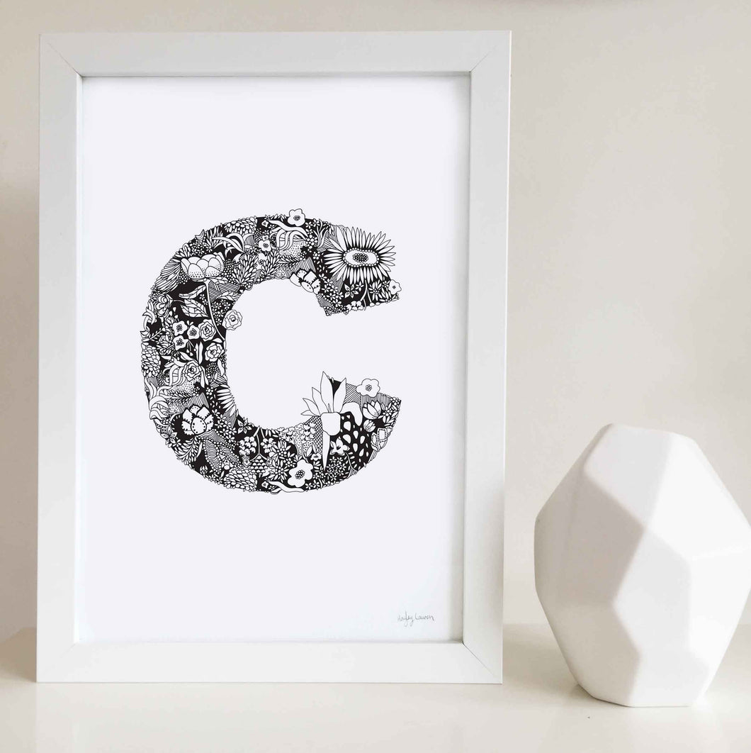 The floral letter C artwork was illustrated by Hayley Lauren in Melbourne, Australia. It is the perfect artwork to personalise a nursery or kids bedroom.