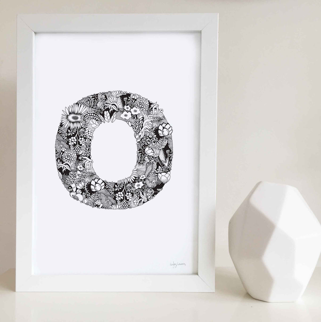 The floral letter 'O' artwork was illustrated by Hayley Lauren in Melbourne, Australia. It is the perfect artwork to personalise a nursery or kids bedroom.