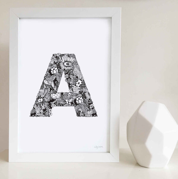 The floral letter 'A' artwork was illustrated by Hayley Lauren in Melbourne, Australia. It is the perfect artwork to personalise a nursery or kids bedroom.