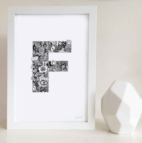 The floral letter 'F' artwork was illustrated by Hayley Lauren in Melbourne, Australia. It is the perfect artwork to personalise a nursery or kids bedroom. 