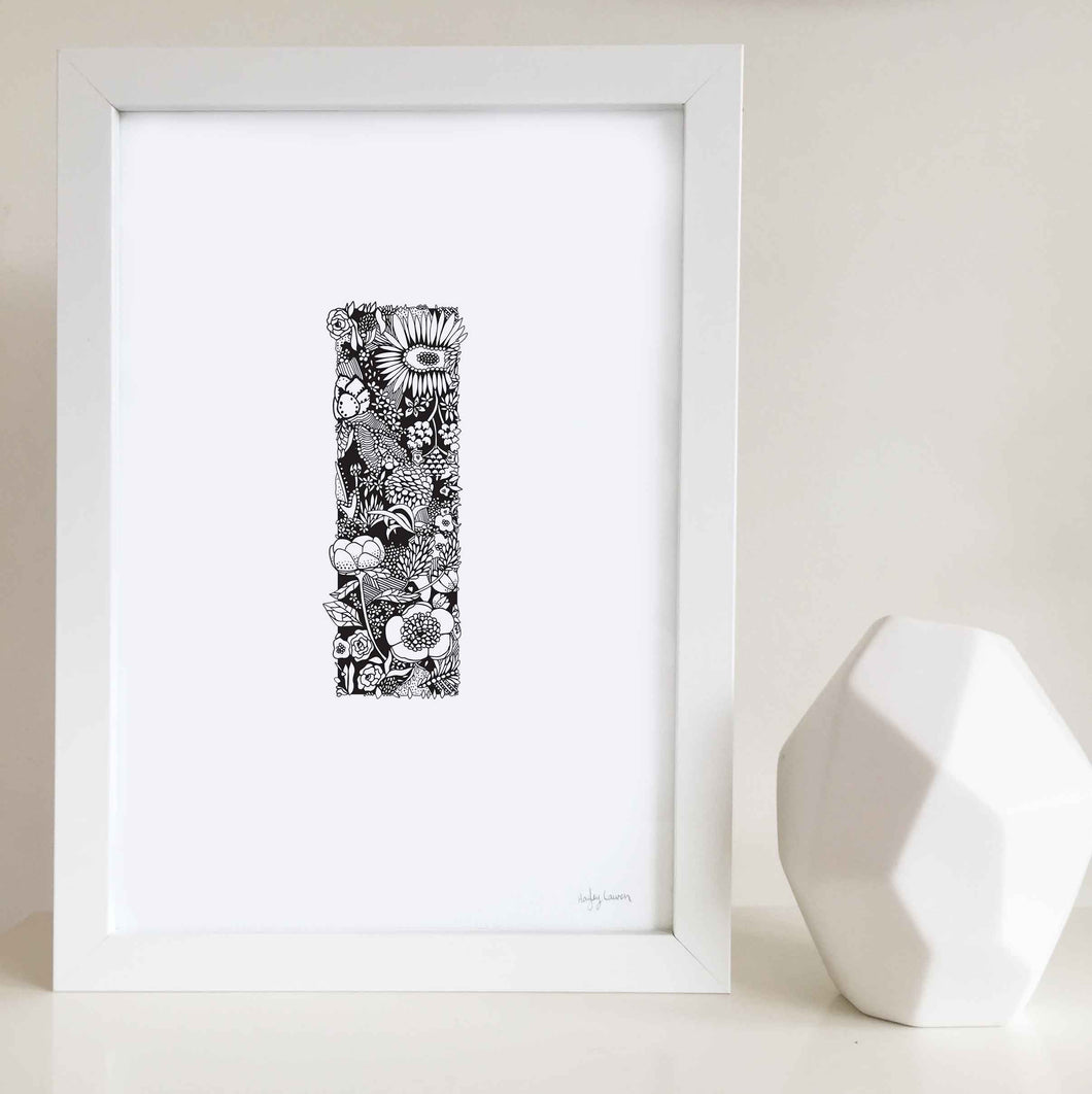 The floral letter 'I' artwork was illustrated by Hayley Lauren in Melbourne, Australia. It is the perfect artwork to personalise a nursery or kids bedroom. 