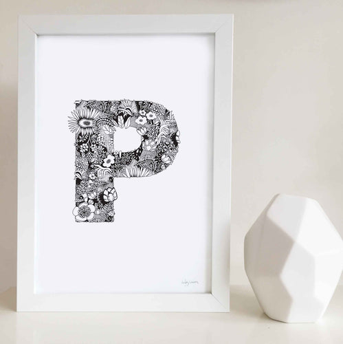 The floral letter 'P' artwork was illustrated by Hayley Lauren in Melbourne, Australia. It is the perfect artwork to personalise a nursery or kids bedroom. 